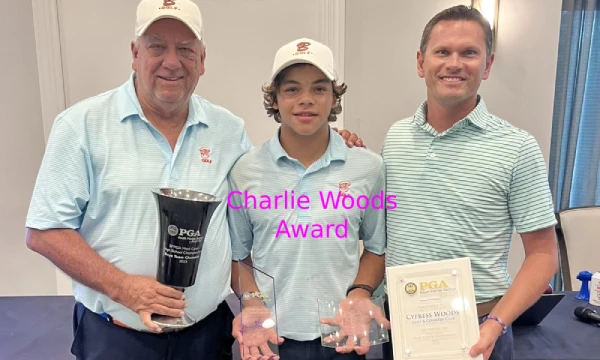 Charlie Woods Picture with awards